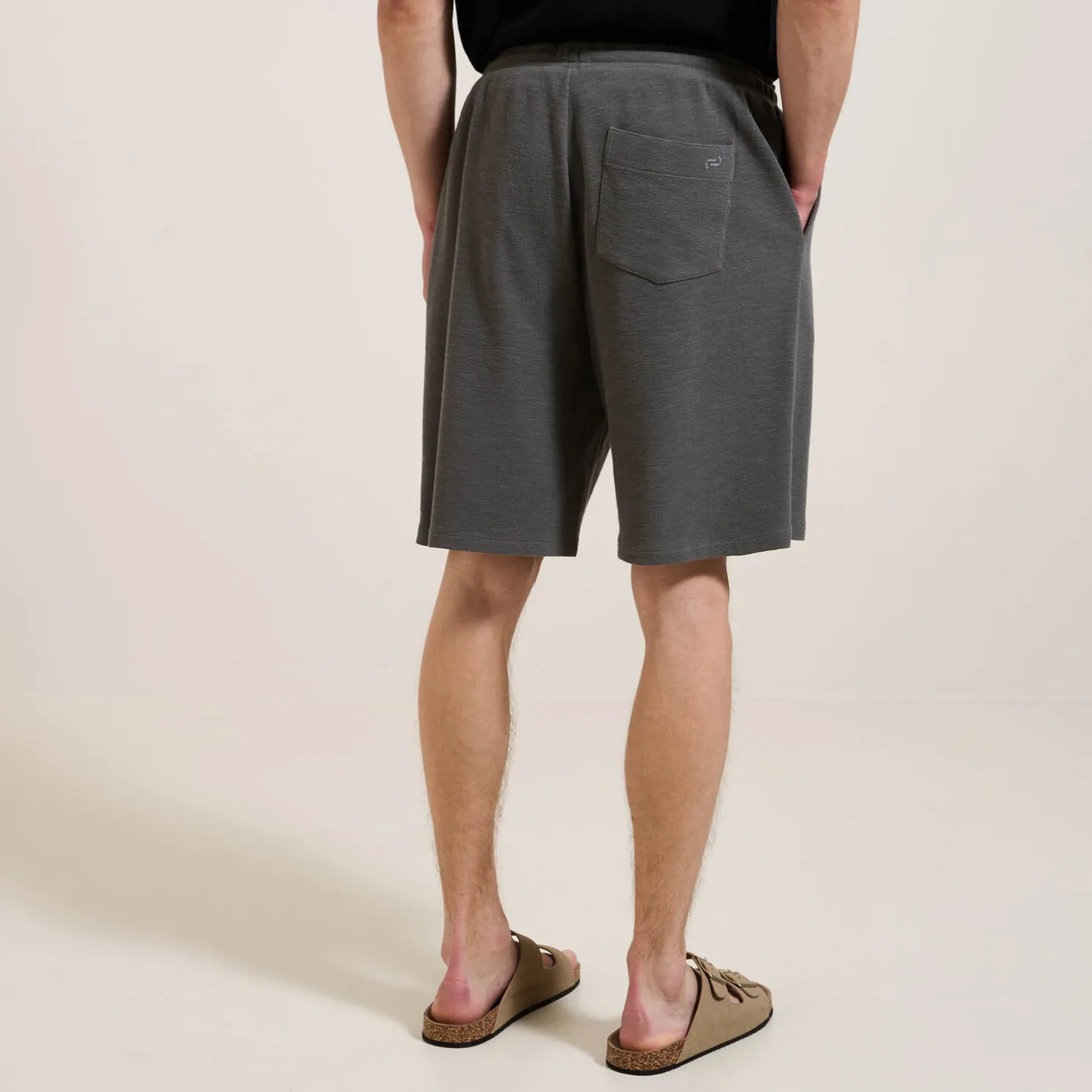 Effen bermuda in textuurstof