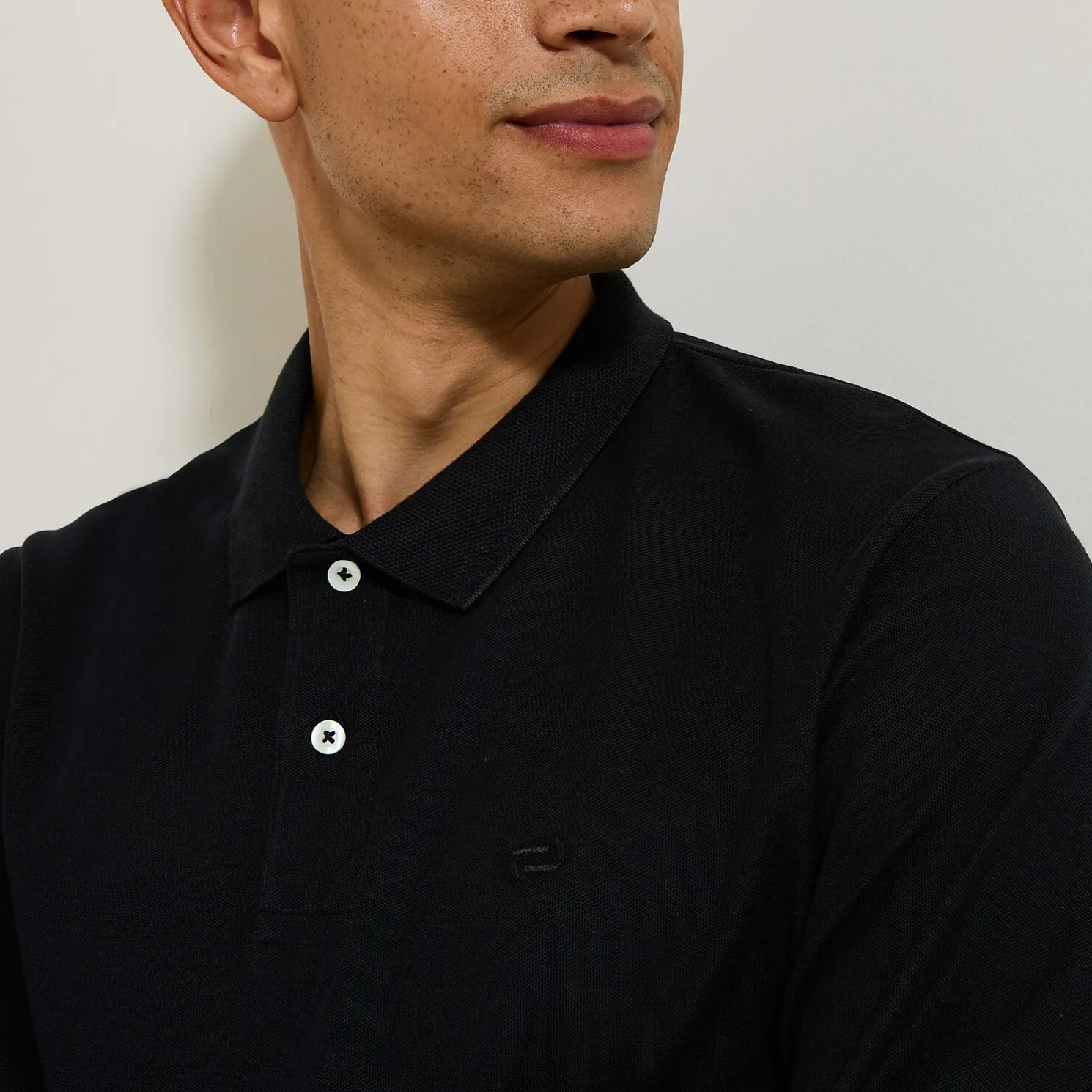 Effen polo in piquékatoen, met lange mouwen