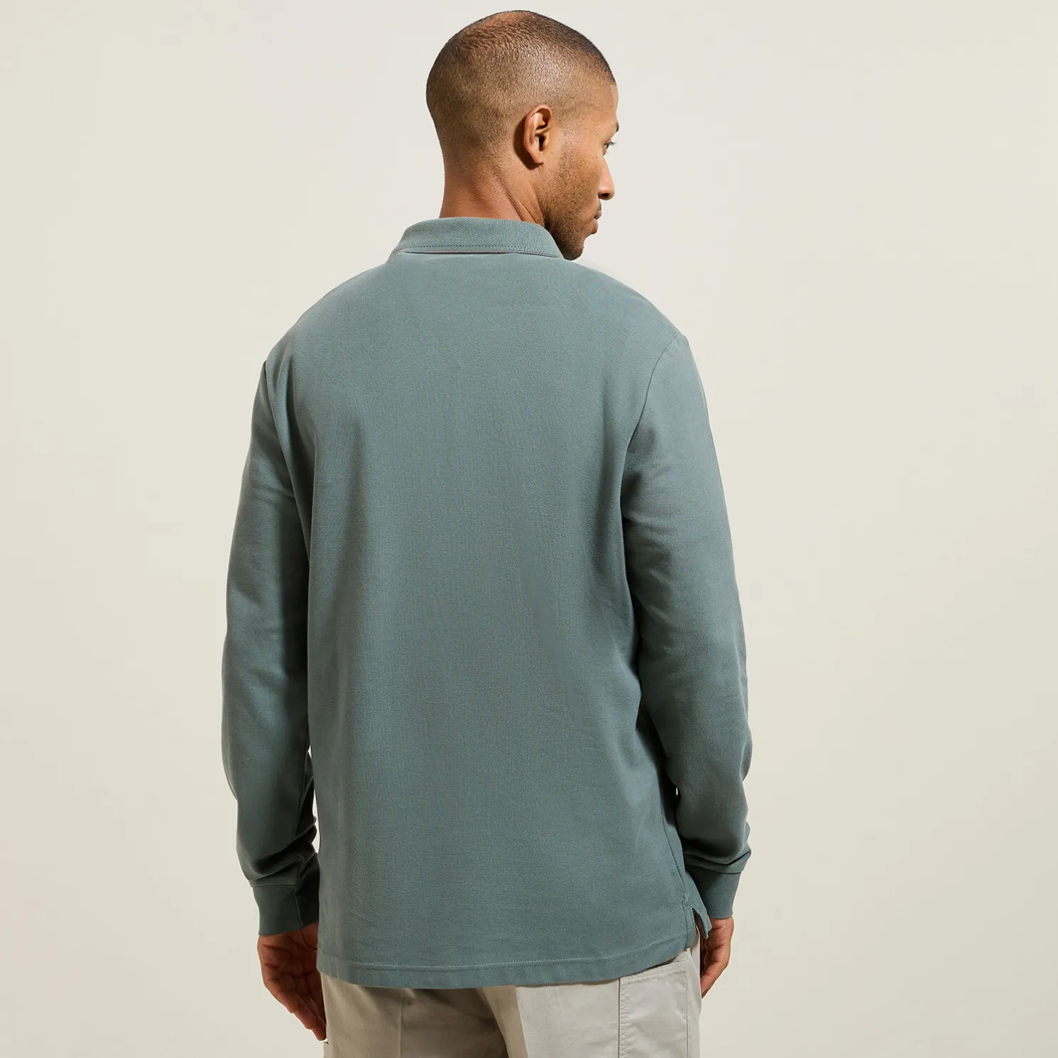 Effen polo in piquékatoen, met lange mouwen