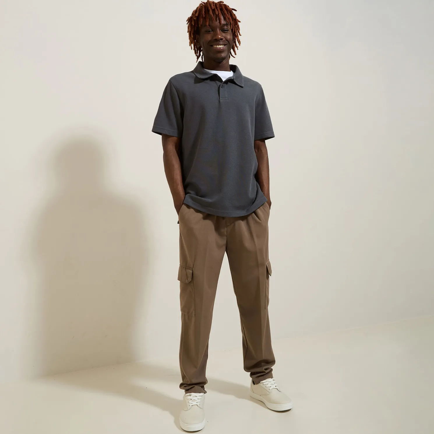 Effen relaxed polo met korte mouwen in textuurstof