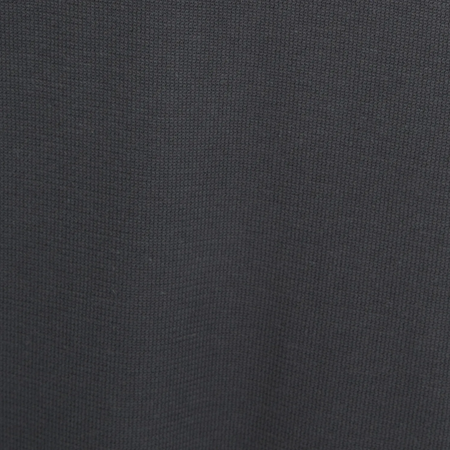 Effen relaxed polo met korte mouwen in textuurstof