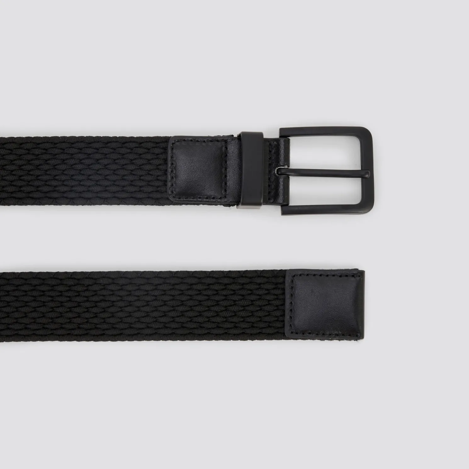 Elastische stoffen riem met rolgesp