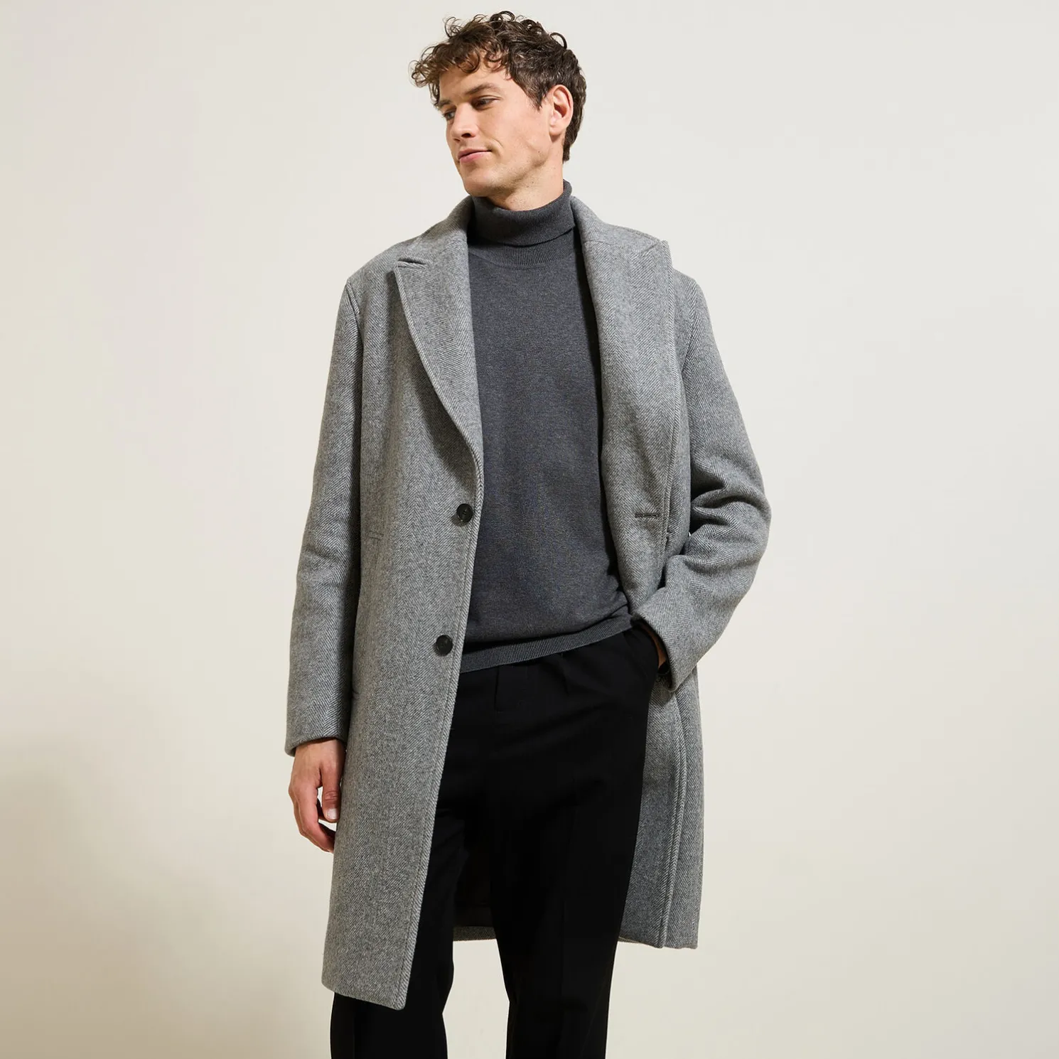 Lange mantel met visgraatmotief en reverskraag