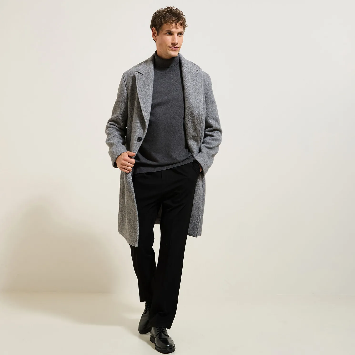 Lange mantel met visgraatmotief en reverskraag