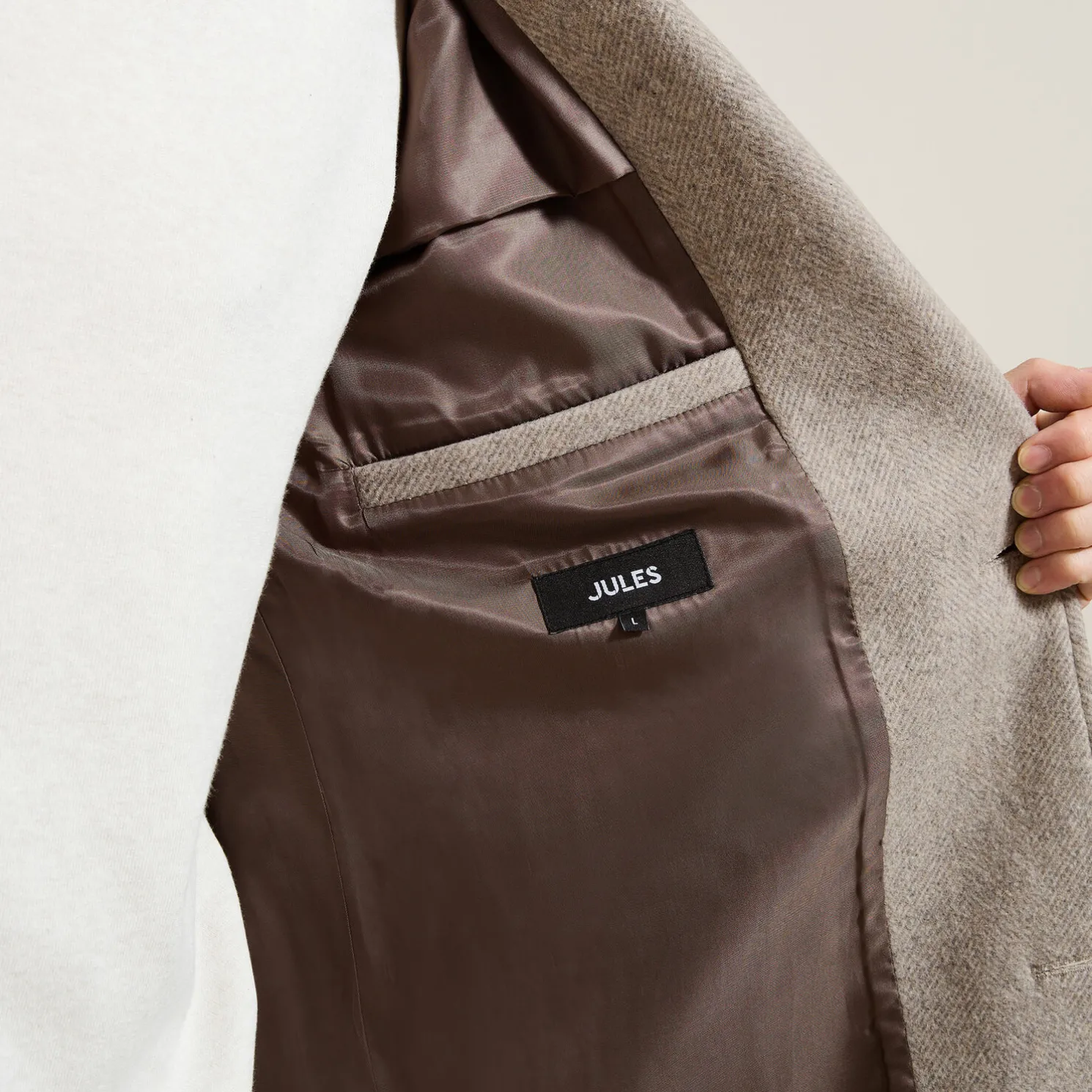 Lange mantel met visgraatmotief en reverskraag