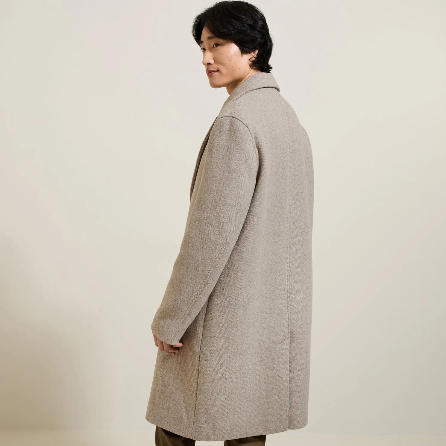 Lange mantel met visgraatmotief en reverskraag