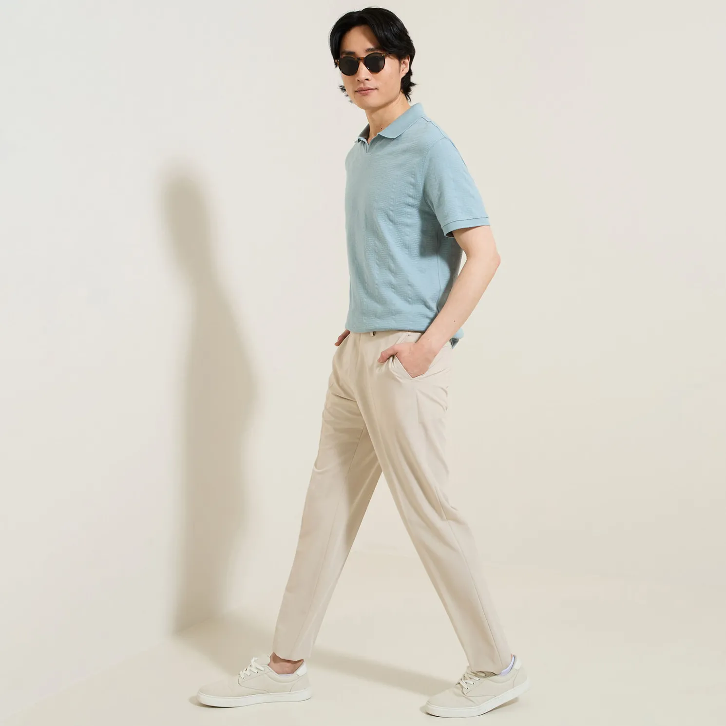 Polo in textuurstof met korte mouwen en resortkraa