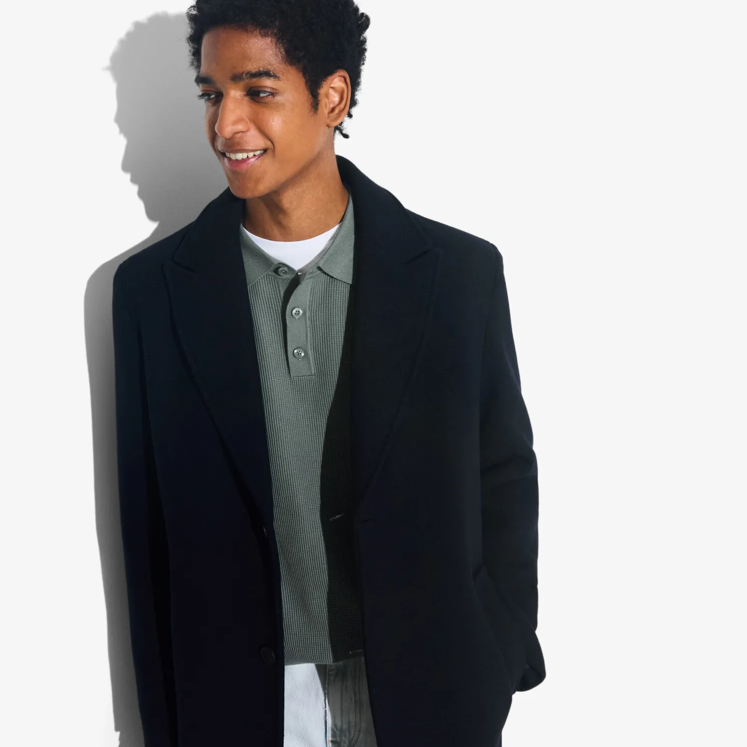 Polo met knopen in textuurstof