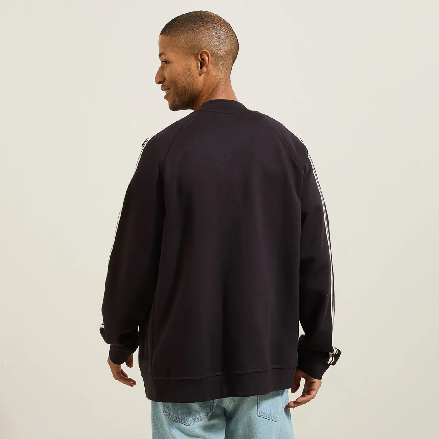 Sweater met rits en mouwstrepen