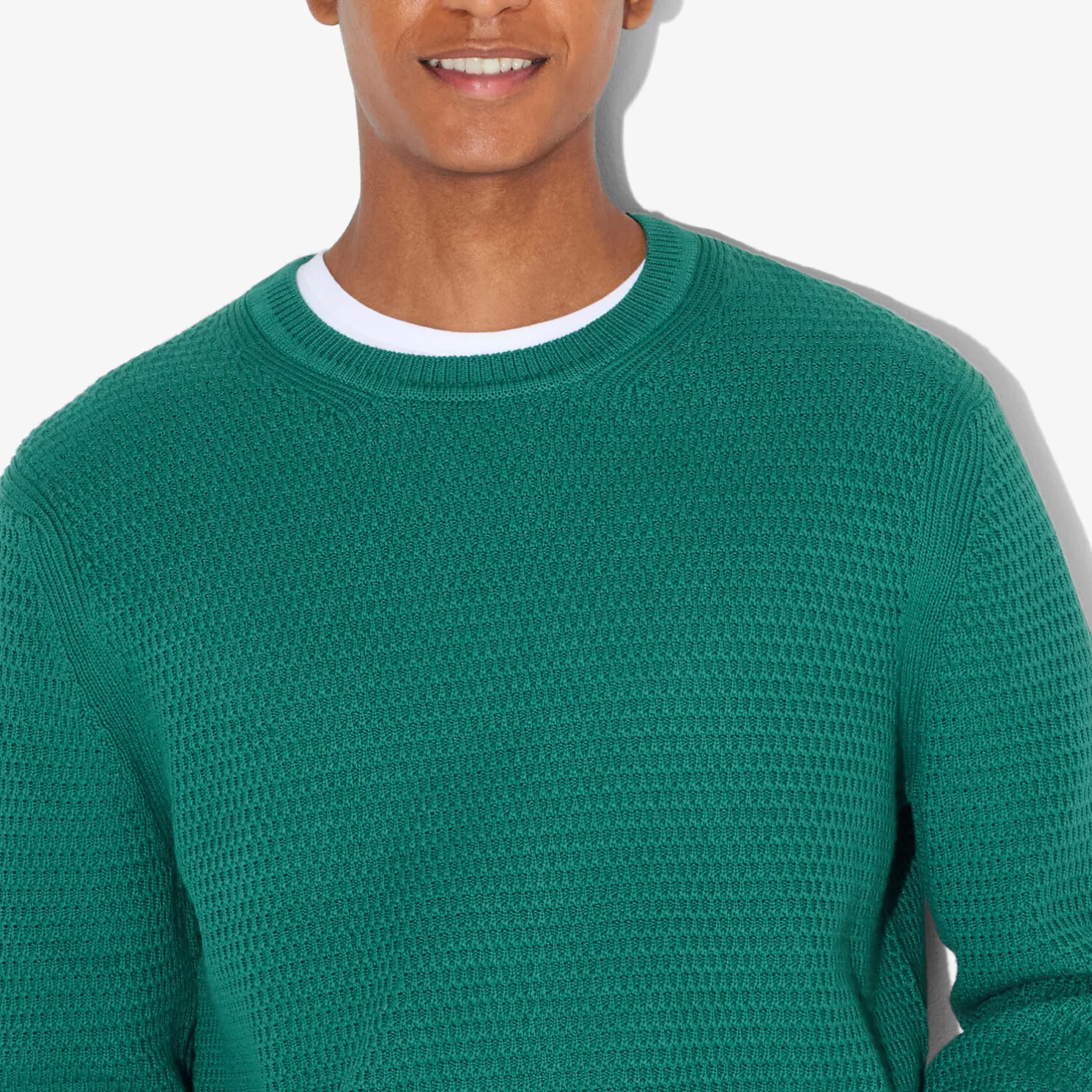 Trui met ronde hals en reliëfsteken