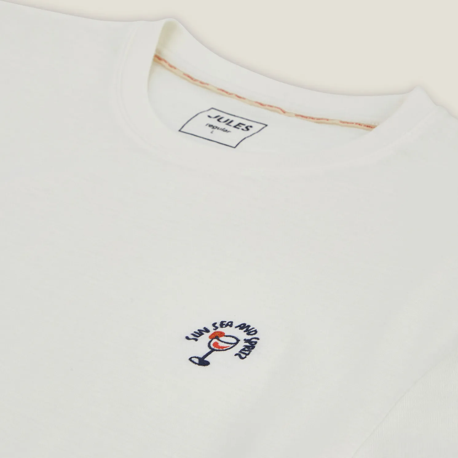 T-shirt in gevlamde stof met borduursel op de bors