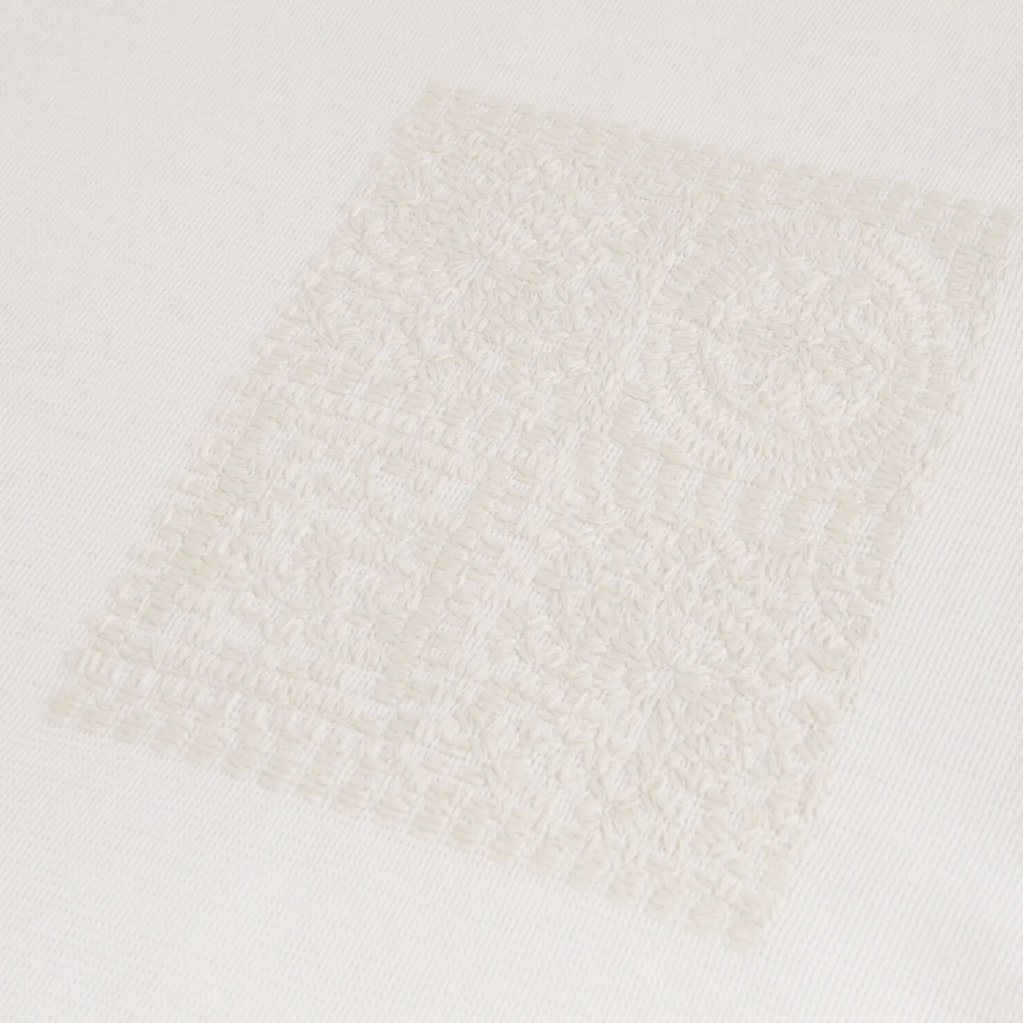 T-shirt in reliëfstof met macramédetailsn